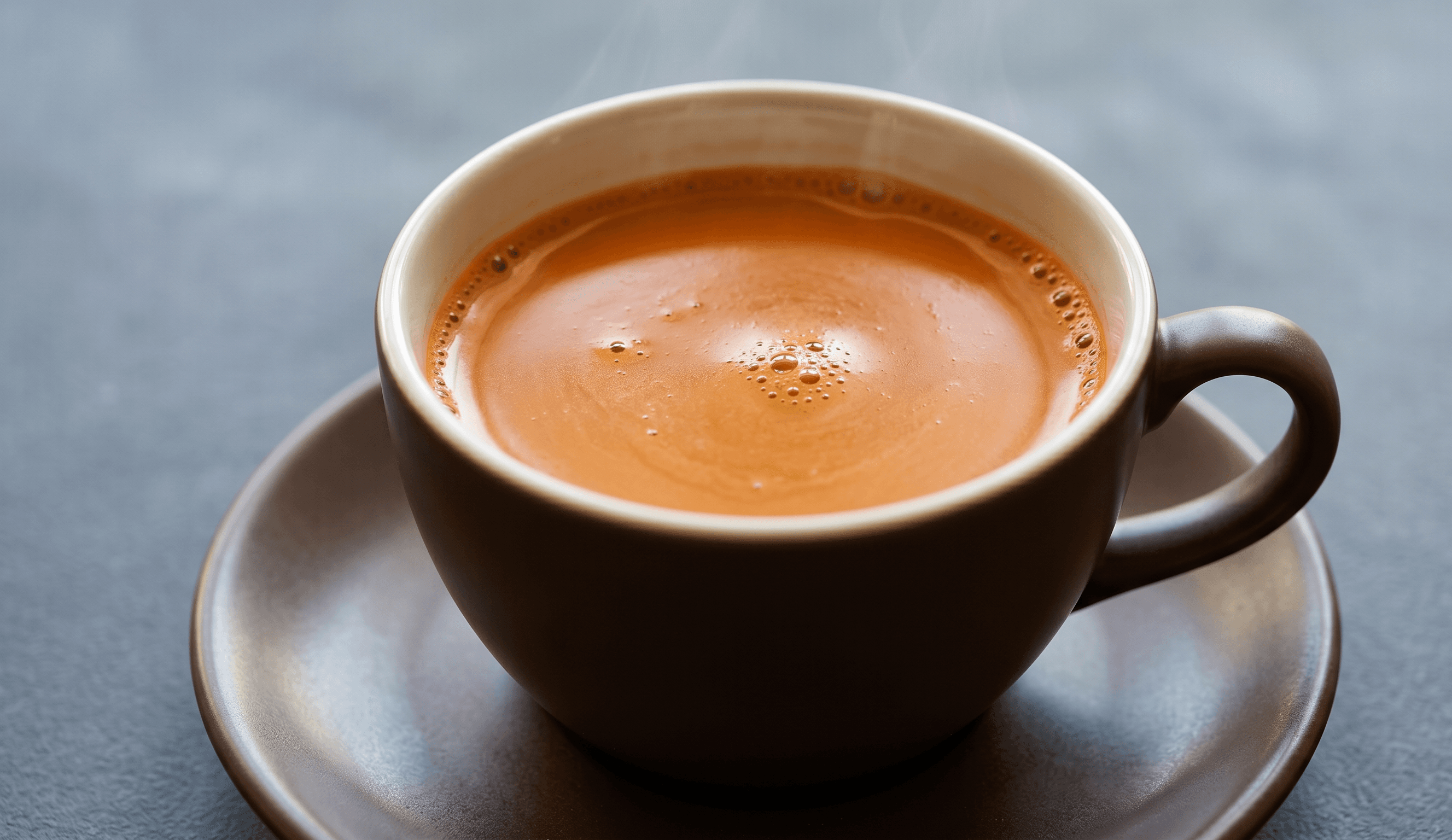 Kadak masala chai brewed with cardamom, ginger, and cinnamon